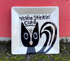 Orange Village Skunk Plate